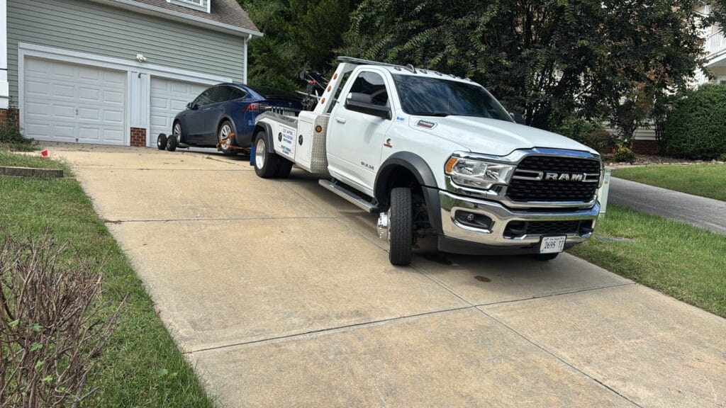 Soot Happens wrecker towing a vehicle